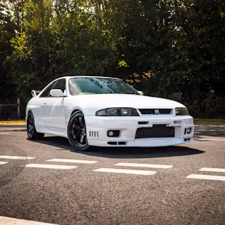 Win This 580BHP Nissan Skyline V-Spec R33 GTR + £1,000 Cash!